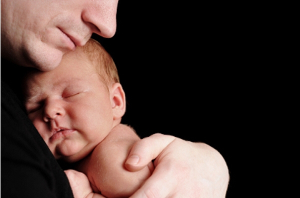 Abrazo de padre a hijo